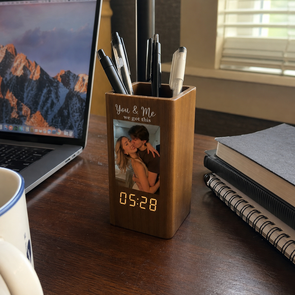 Ethan L., Couple Pen Holder with Clock